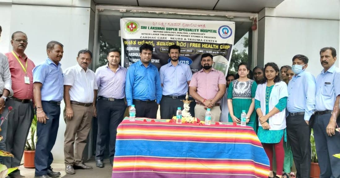 Sri Lakshmi Super Speciality Hospital staff and dignitaries at the inauguration of a free health camp.
